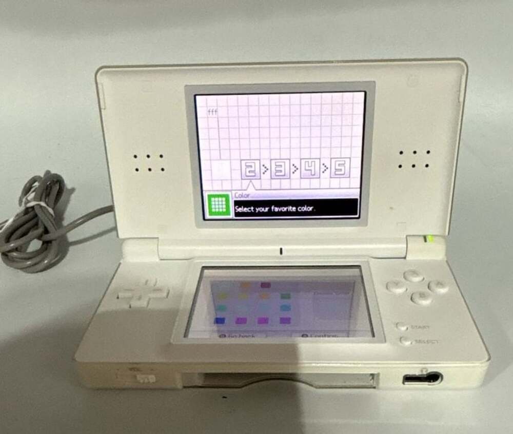 Nintendo DS Lite Polar White Handheld Console with Charger, Case, and 6 Games